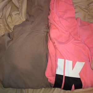 Two pink sweatshirts